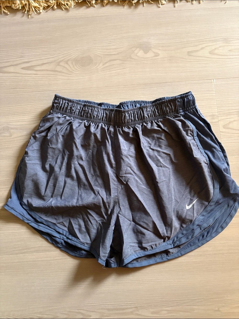 Nike Women's Charcoal Gray Athletic Shorts with Dark Trim